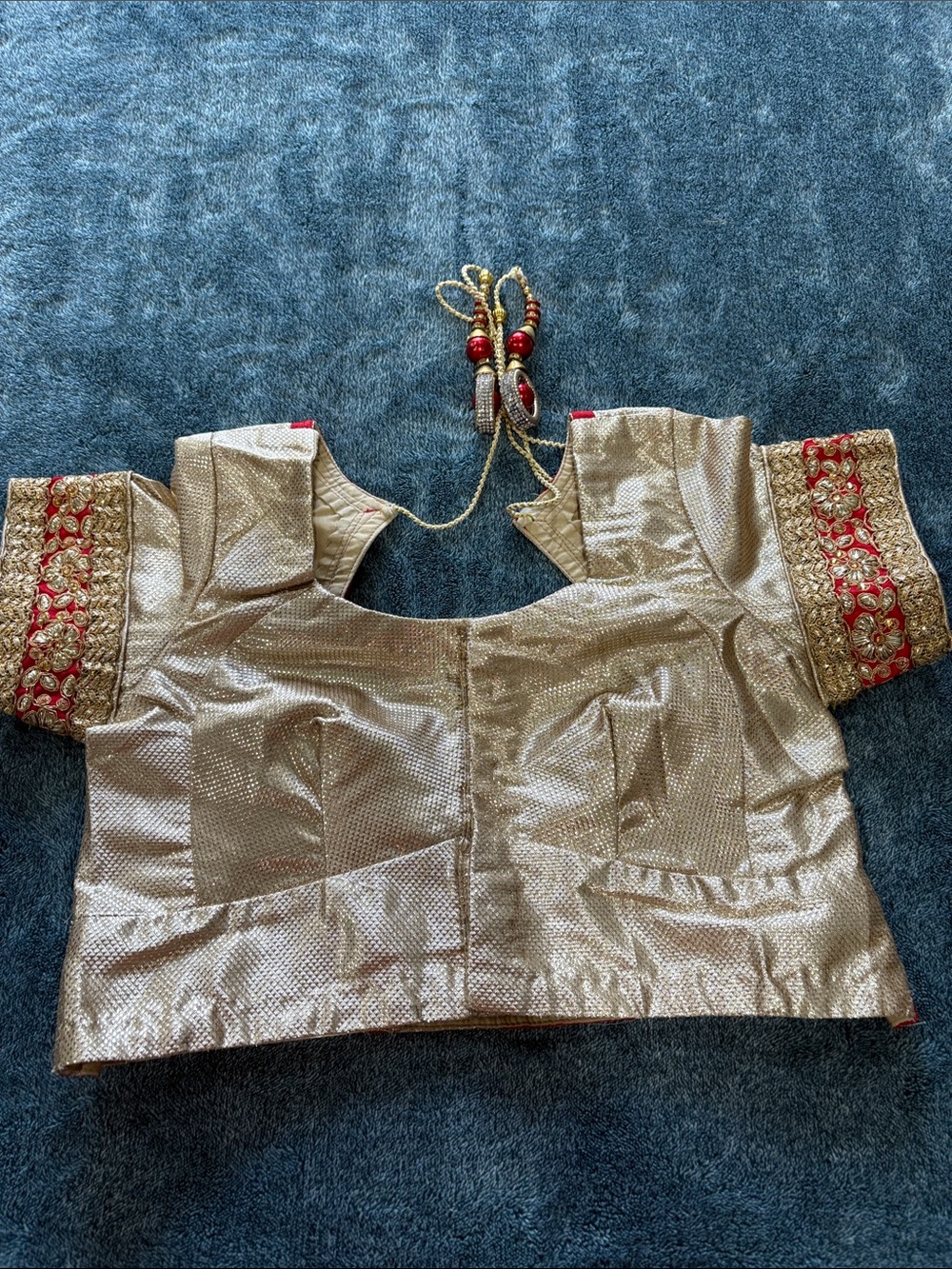 Traditional Women's Gold Embroidered Blouse with Red Accents